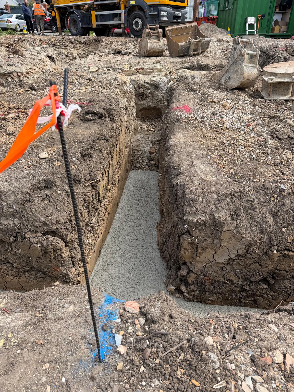Commercial groundworks: excavating and pouring new concrete foundations